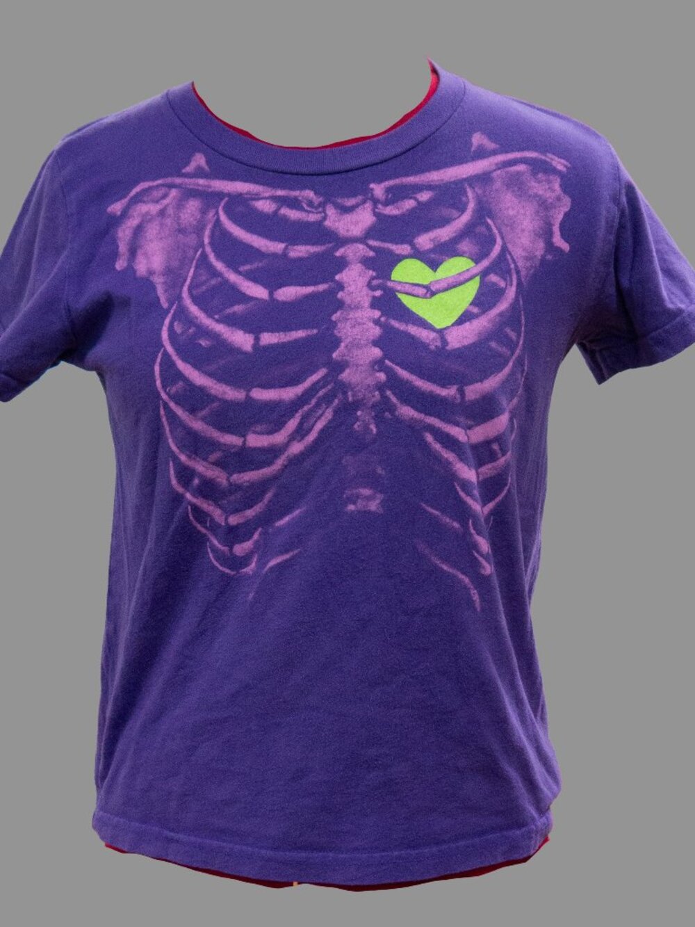 Striking purple and green skeleton tee